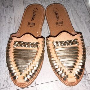 Colloons brand gold-tone woven huarache-style slip-on sandals,made in Mexico.